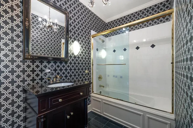 a view of a yard with plants and trees