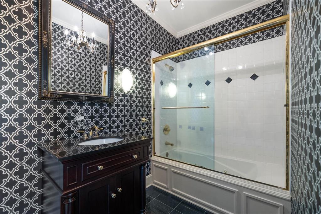 1102 Palmview Avenue Belleair, FL 33756 - Photo 42 of 81 a bathroom with a bathtub and shower