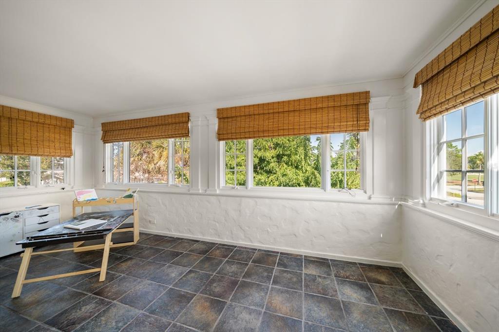 1102 Palmview Avenue Belleair, FL 33756 - Photo 50 of 81 a living room with a window and a table