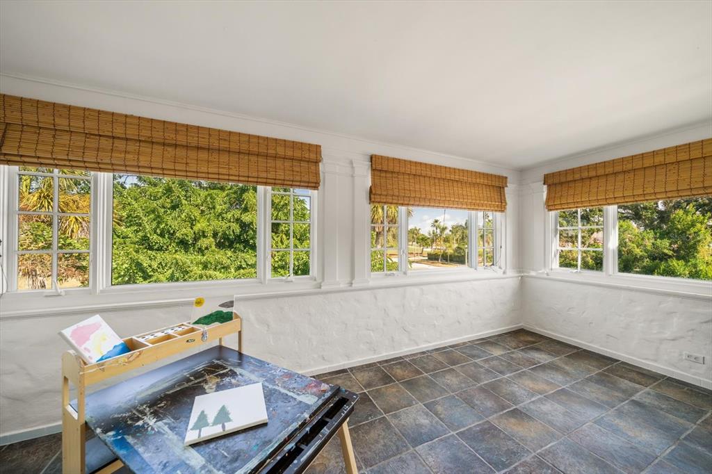 1102 Palmview Avenue Belleair, FL 33756 - Photo 51 of 81 a living room with furniture and a window