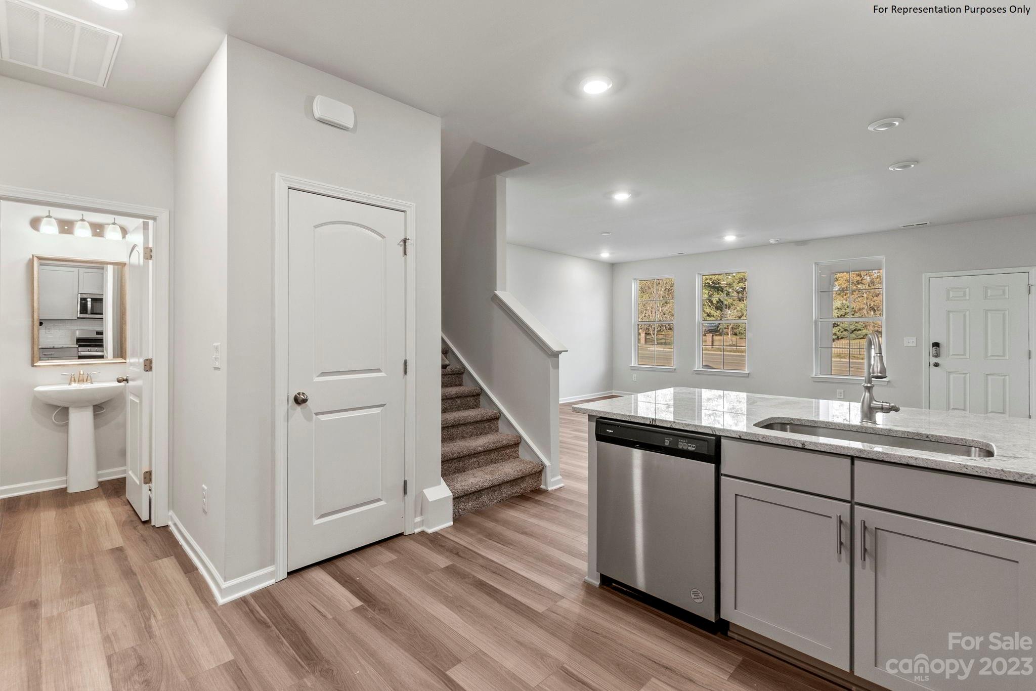1948 Plath Top Road, Unit 24 Rock Hill, SC 29732 - Photo 13 of 44 a kitchen with a sink and wooden floor