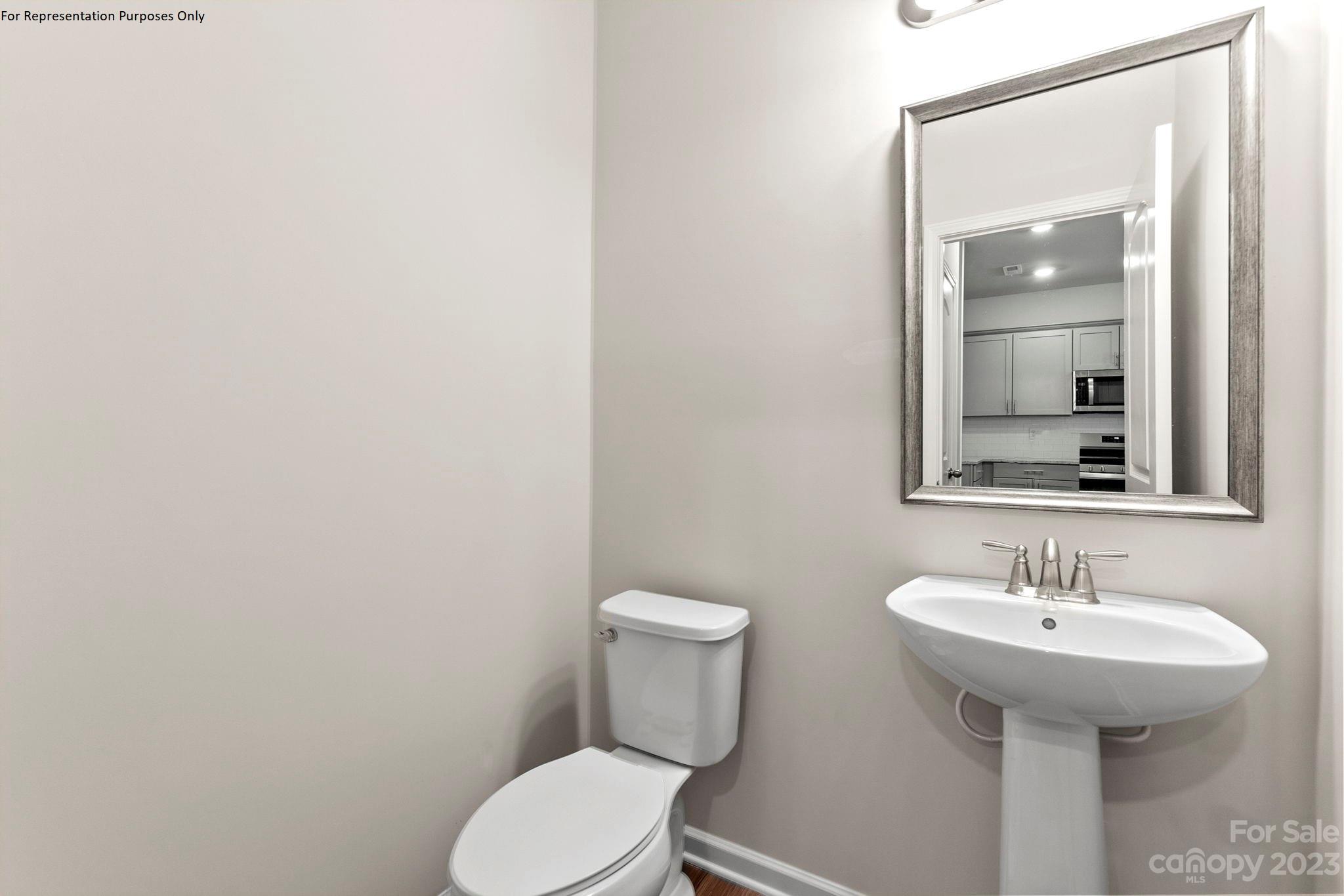 1948 Plath Top Road, Unit 24 Rock Hill, SC 29732 - Photo 14 of 44 a bathroom with a sink and a toilet