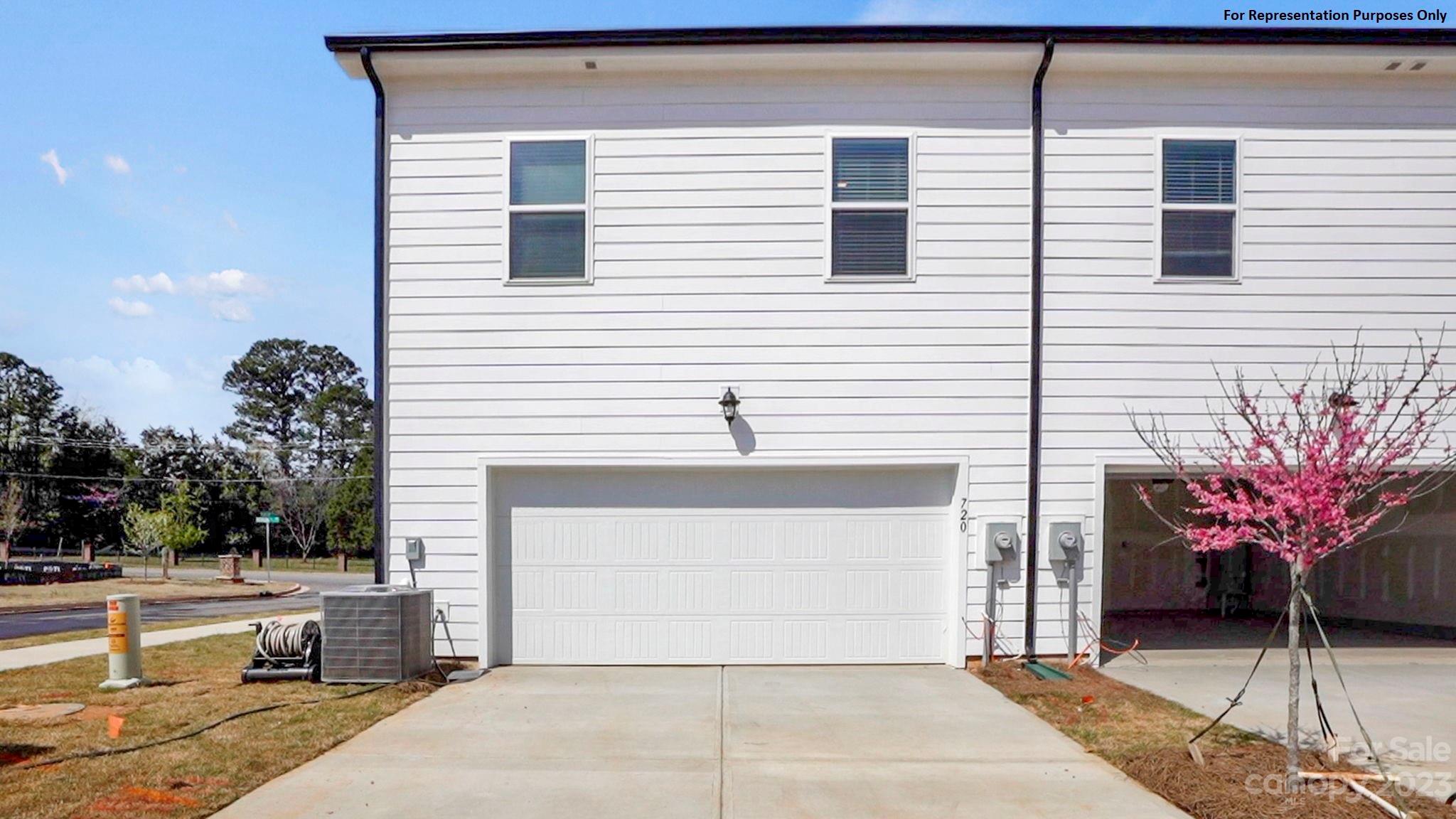 1948 Plath Top Road, Unit 24 Rock Hill, SC 29732 - Photo 2 of 44 a front view of a house with a garage