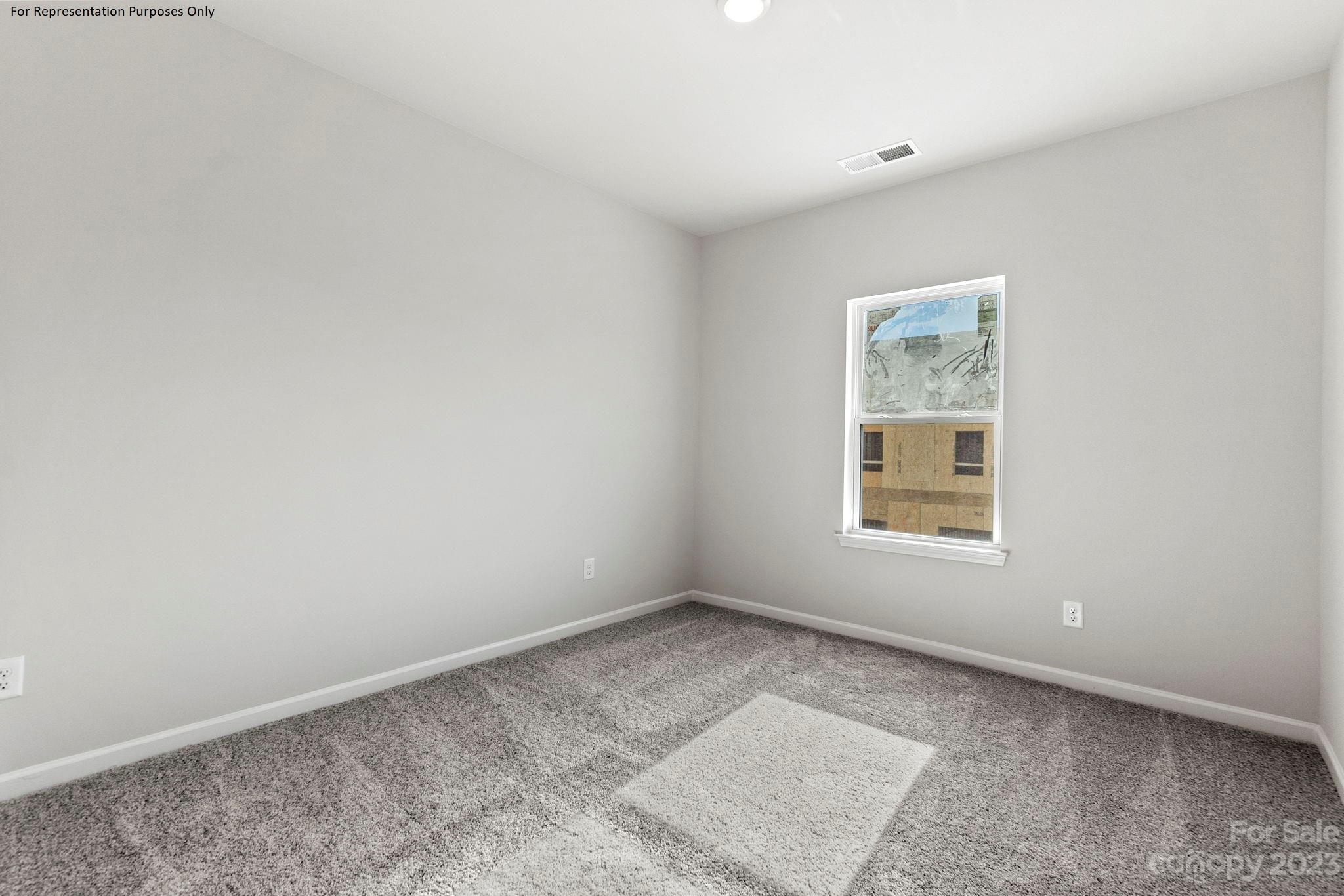 1948 Plath Top Road, Unit 24 Rock Hill, SC 29732 - Photo 21 of 44 an empty room with a window