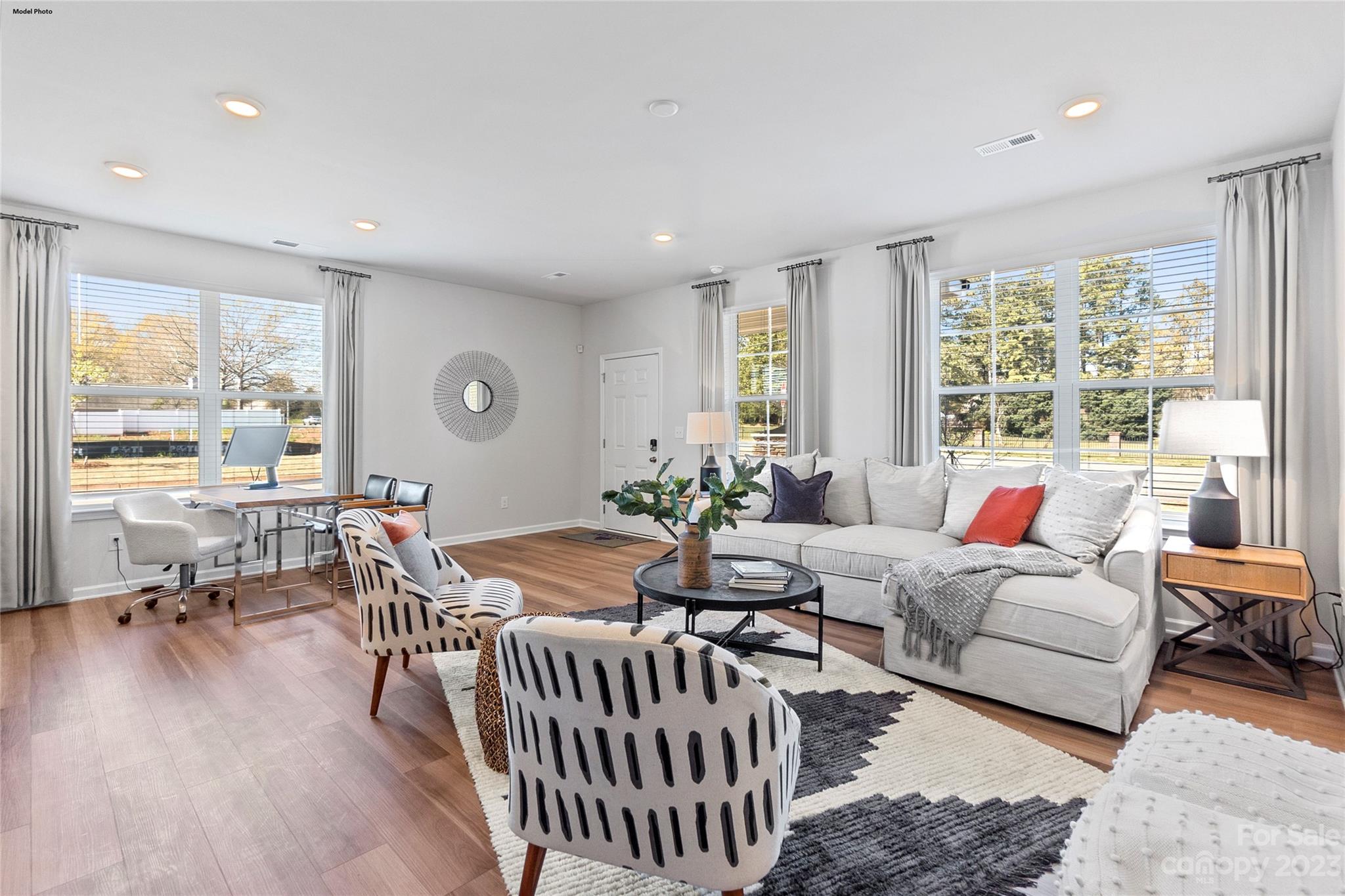 1948 Plath Top Road, Unit 24 Rock Hill, SC 29732 - Photo 23 of 44 a living room with furniture and a large window