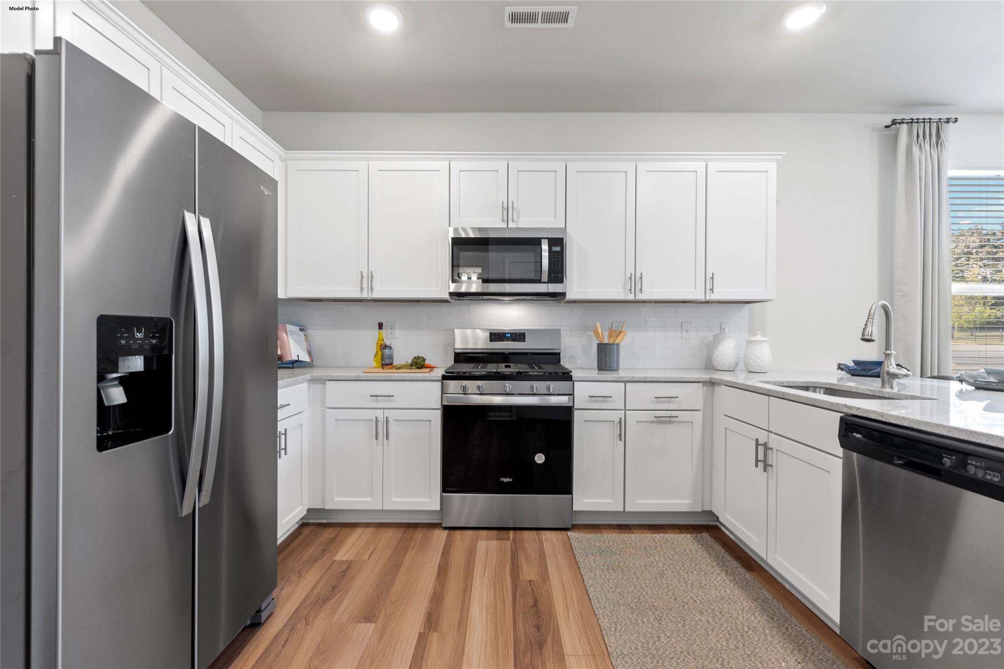 1948 Plath Top Road, Unit 24 Rock Hill, SC 29732 - Photo 31 of 44 a kitchen with a refrigerator stove and sink
