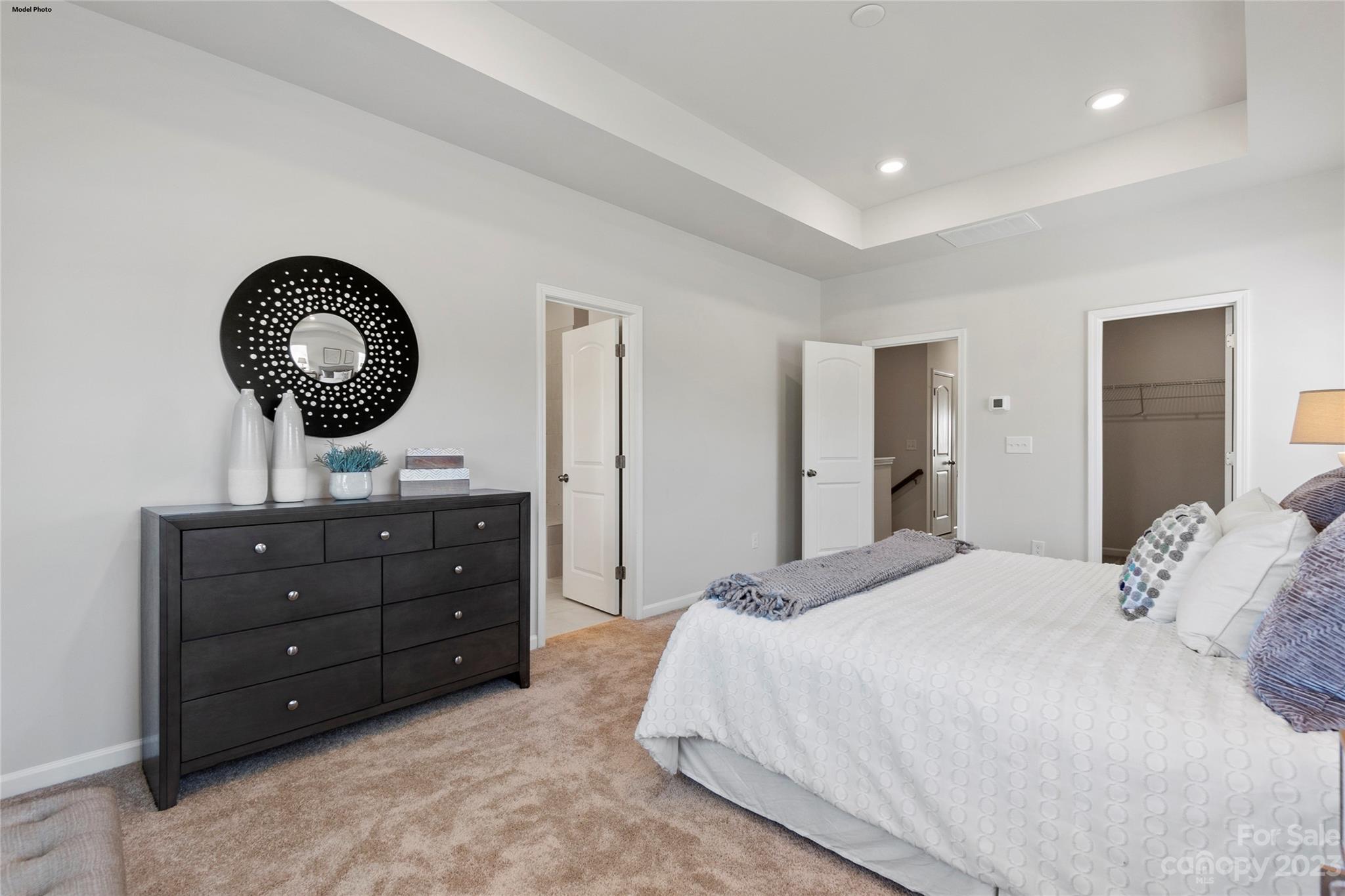 1948 Plath Top Road, Unit 24 Rock Hill, SC 29732 - Photo 34 of 44 a bedroom with a bed and a table