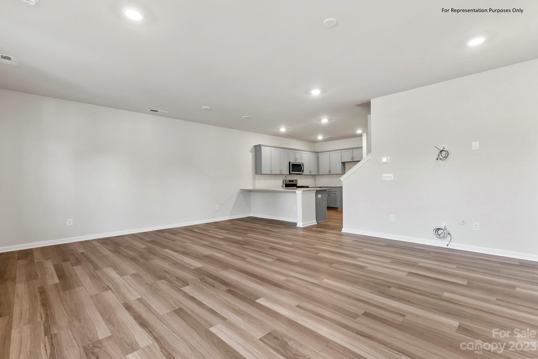 1948 Plath Top Road, Unit 24 Rock Hill, SC 29732 - Photo 9 of 44 a view of empty room with wooden floor