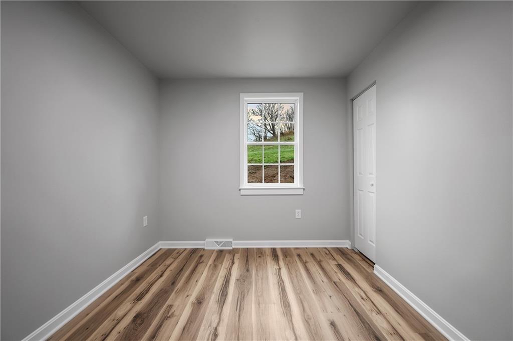 6340 Old Rte 8 North Butler, PA 16002 - Photo 16 of 33 a view of a room with wooden floor and window
