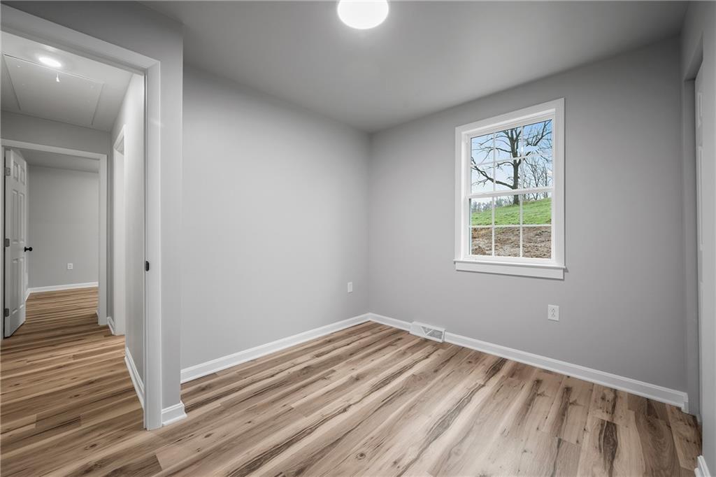 6340 Old Rte 8 North Butler, PA 16002 - Photo 17 of 33 a view of a room with wooden floor and window