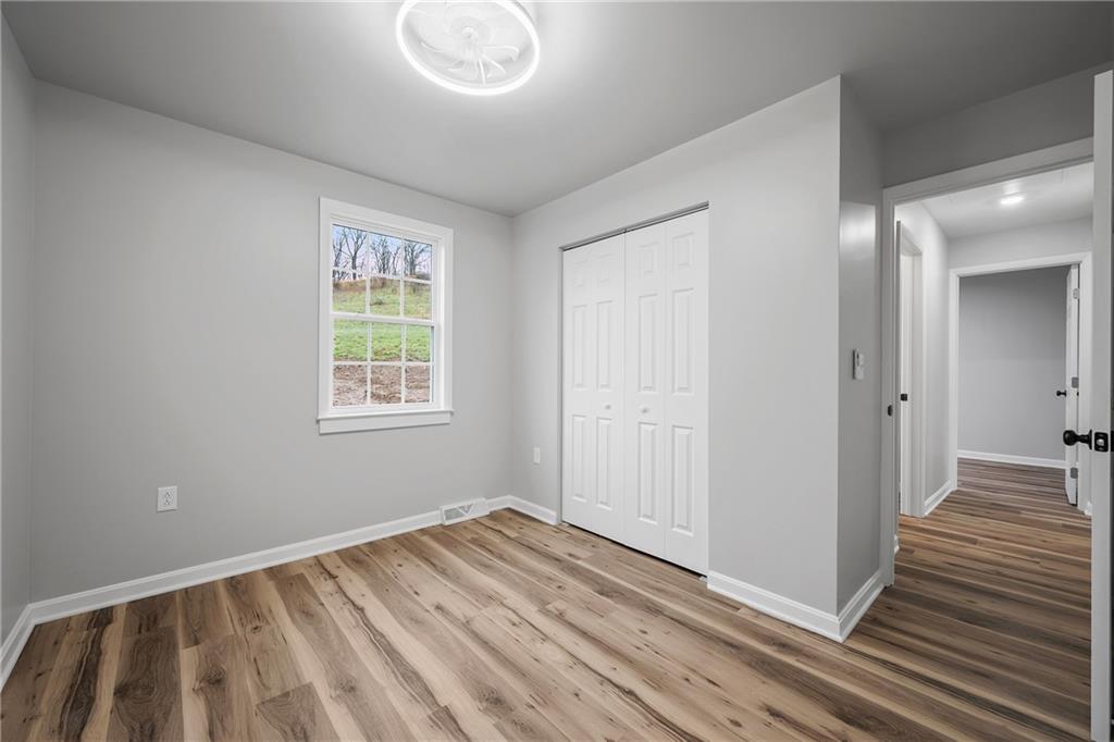6340 Old Rte 8 North Butler, PA 16002 - Photo 20 of 33 a view of a room with wooden floor and window