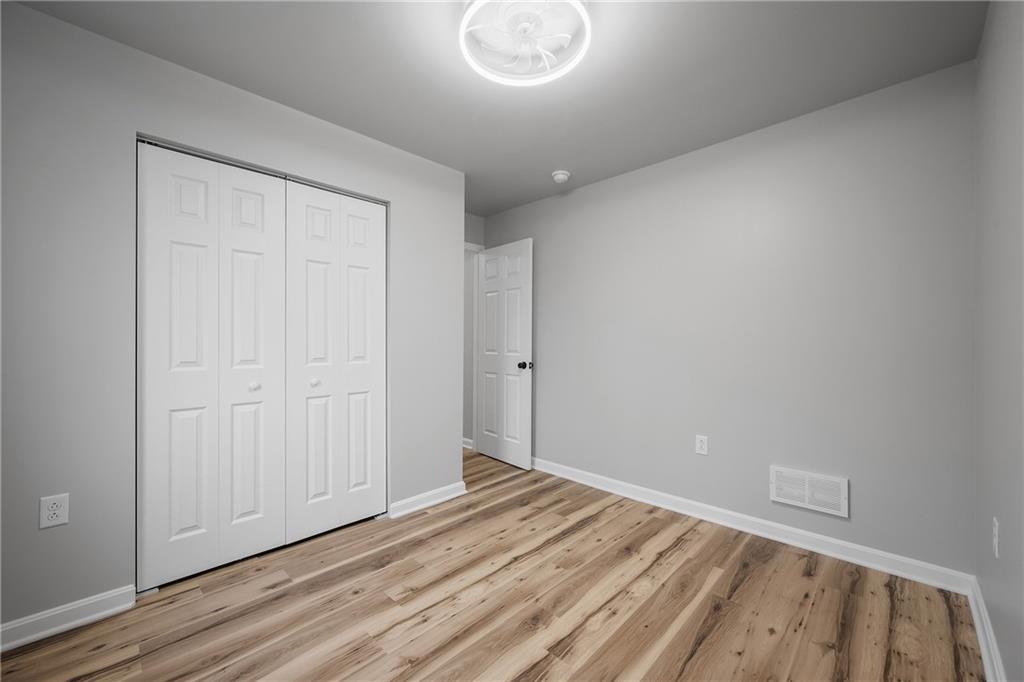 6340 Old Rte 8 North Butler, PA 16002 - Photo 21 of 33 a view of a room with wooden floor and white walls
