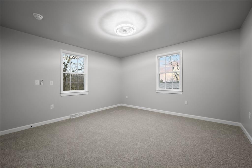 6340 Old Rte 8 North Butler, PA 16002 - Photo 23 of 33 an empty room with windows