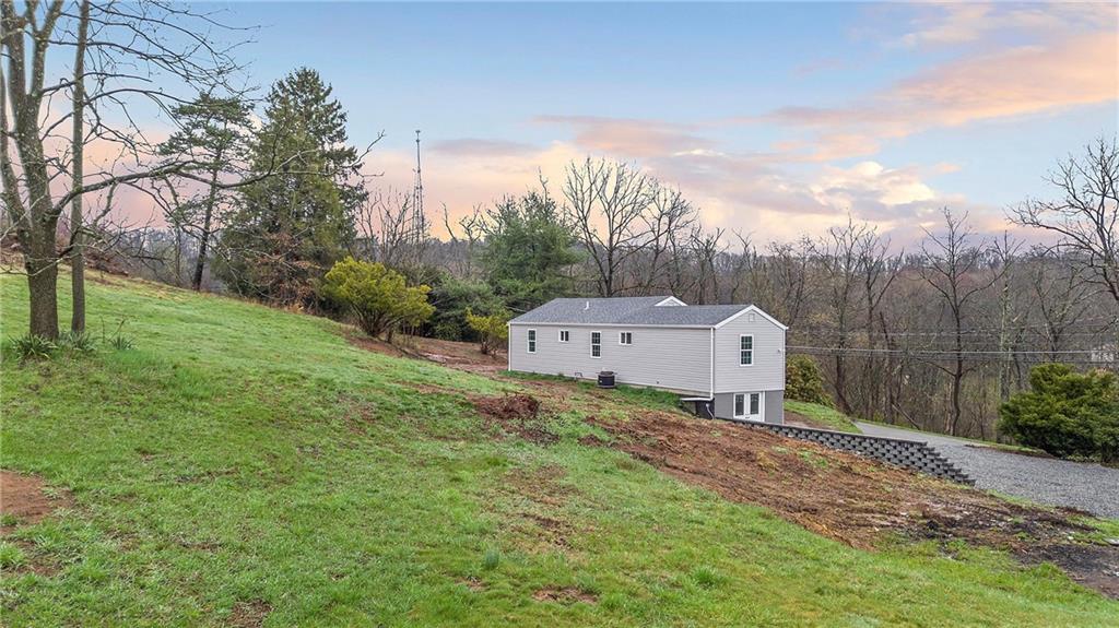 6340 Old Rte 8 North Butler, PA 16002 - Photo 27 of 33 a front view of a house with a yard