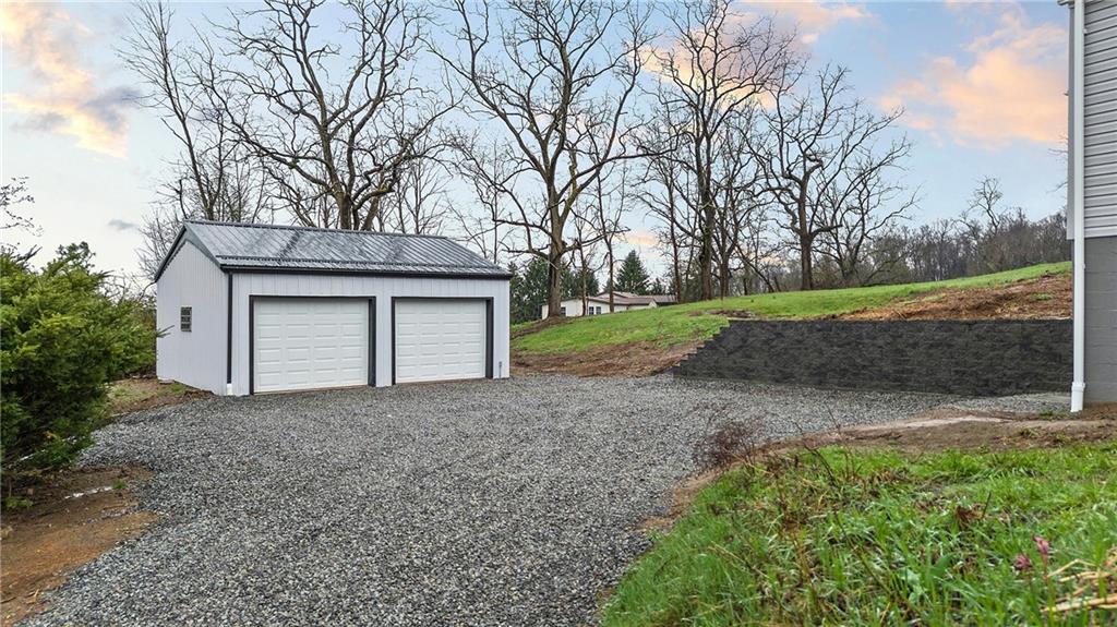 6340 Old Rte 8 North Butler, PA 16002 - Photo 3 of 33 a view of a house with a yard and garage