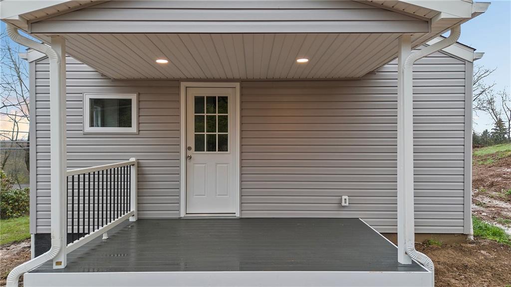 6340 Old Rte 8 North Butler, PA 16002 - Photo 5 of 33 a view of a porch with a door and wooden floor