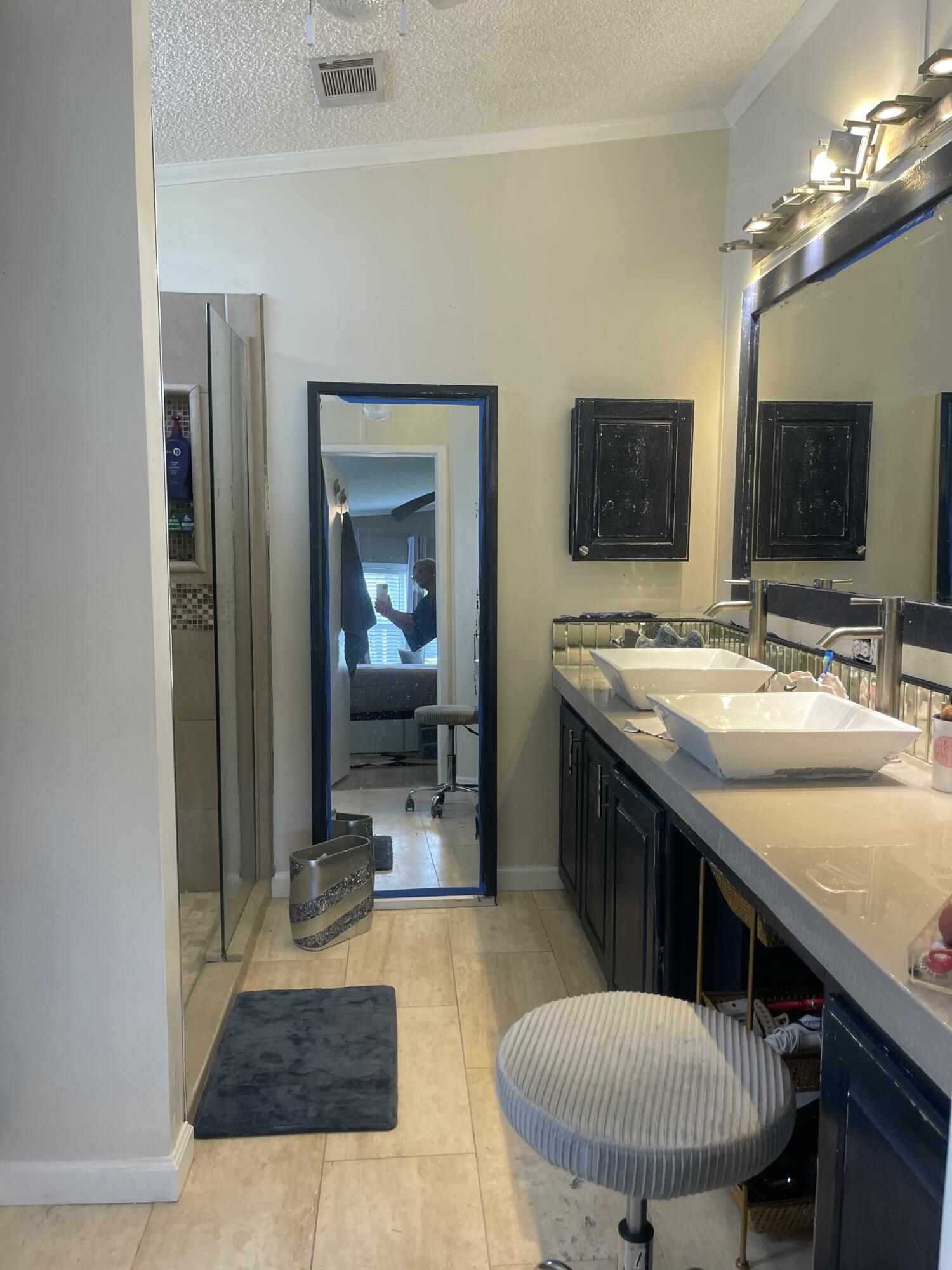817 Sunglow Street Boynton Beach, FL 33436 - Photo 7 of 15 a bathroom with a sink double vanity granite and a mirror