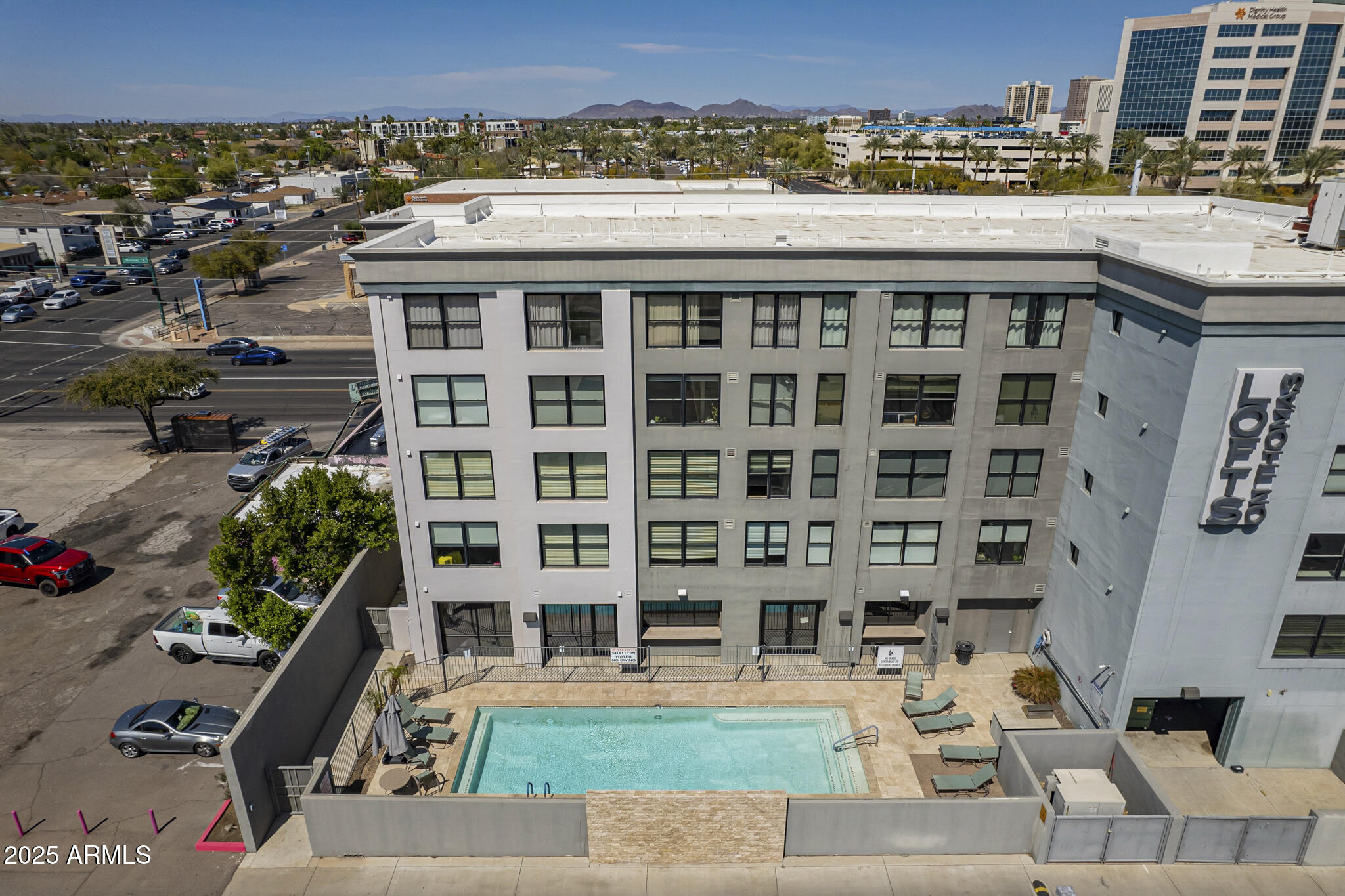 535 West Thomas Road, Unit 410 Phoenix, AZ 85013 - Photo 20 of 33 an aerial view of a multi story parking building