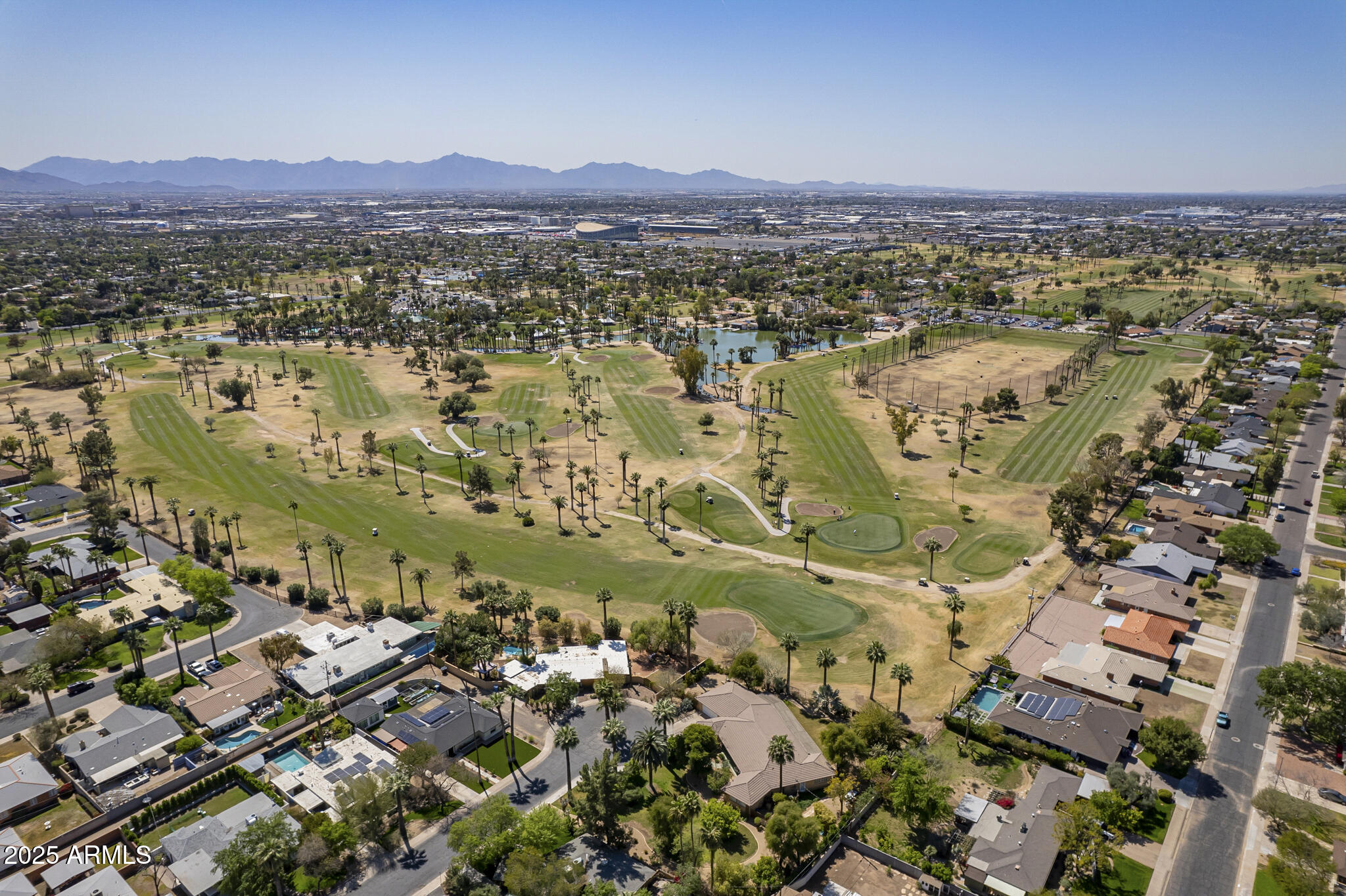 535 West Thomas Road, Unit 410 Phoenix, AZ 85013 - Photo 24 of 33 an aerial view of residential house and lake view