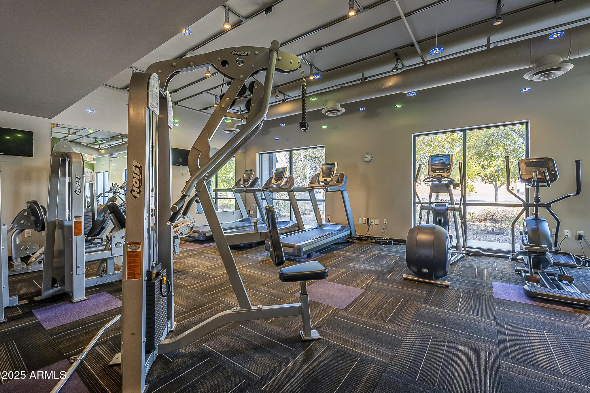 535 West Thomas Road, Unit 410 Phoenix, AZ 85013 - Photo 32 of 33 a view of a room with gym equipment