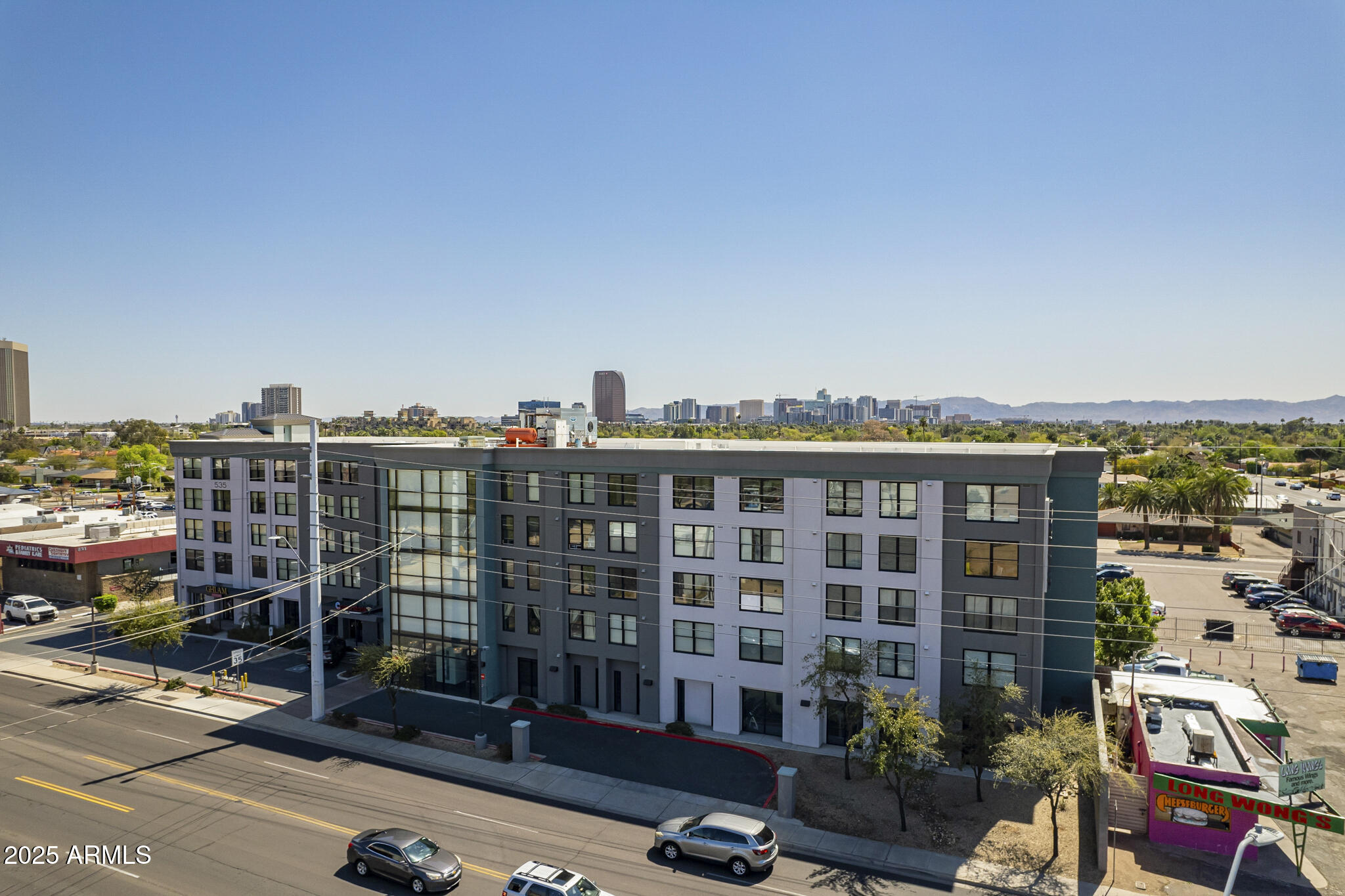 535 West Thomas Road, Unit 410 Phoenix, AZ 85013 - Photo 10 of 33 a view of a city that has tall buildings