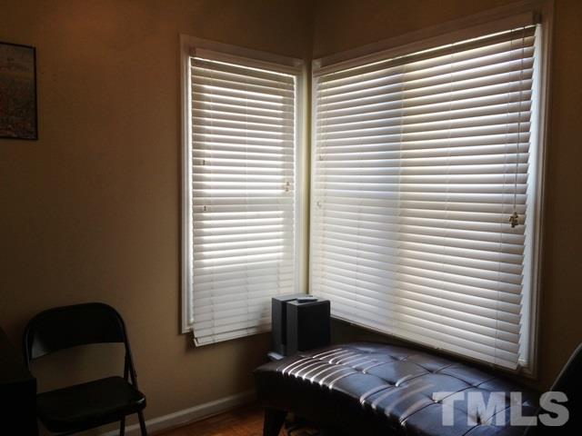6000 Winterpointe Lane, Unit 303 Raleigh, NC 27606 - Photo 7 of 15 a living room with a window