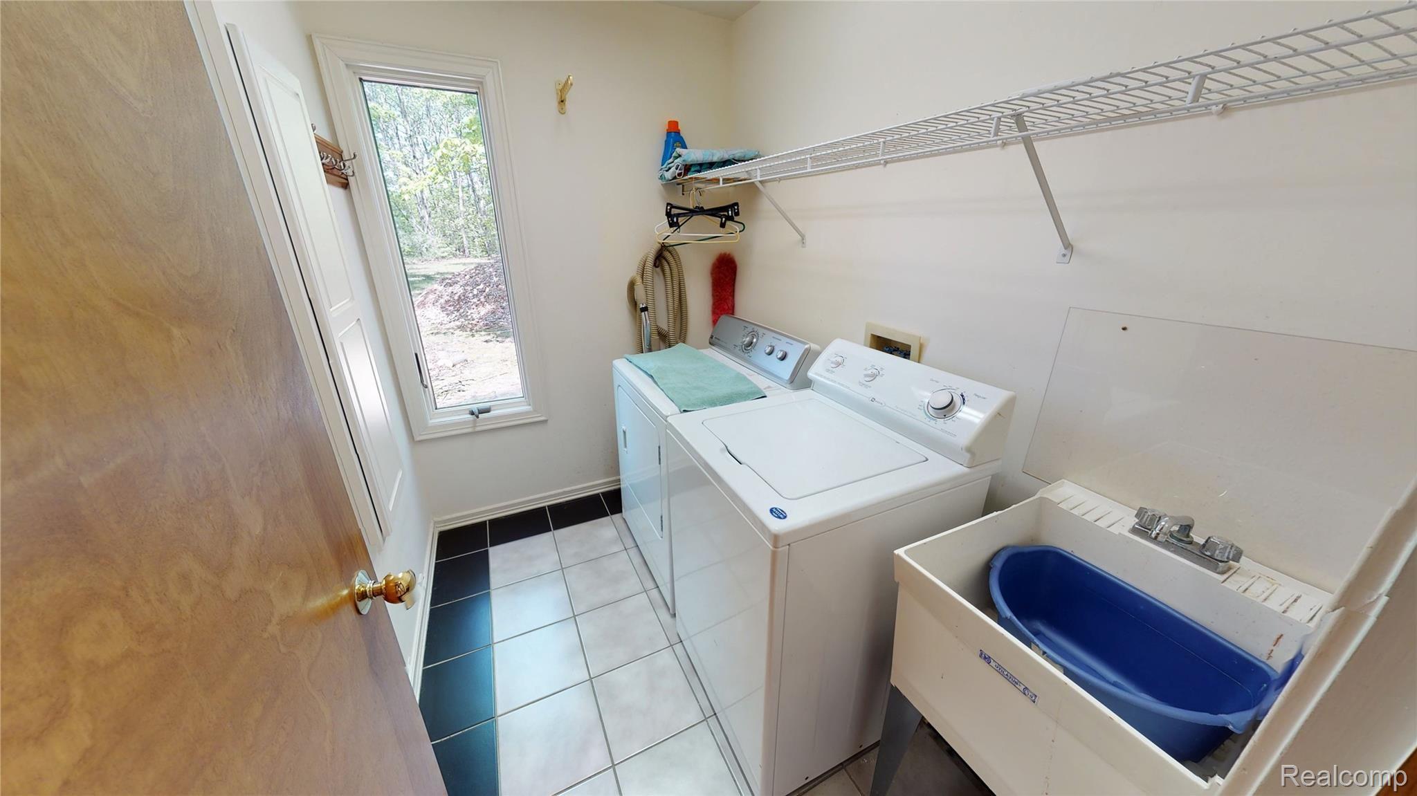 3145 Levalley Road Columbiaville, MI 48421 - Photo 41 of 79 Laundry first floor.jpg