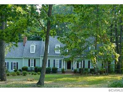 14402 Michaels Ridge Road Midlothian, VA 23113 - Photo 1 of 1 a front view of a house with a yard