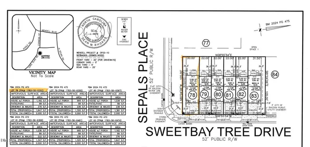 a view of a hallway with wooden floor and entryway