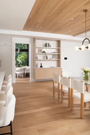 a room with furniture and a large window