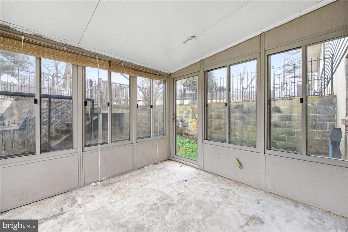 8709 Hawkins Creamery Road Gaithersburg, MD 20882 - Photo 32 of 36 Enclosed Porch