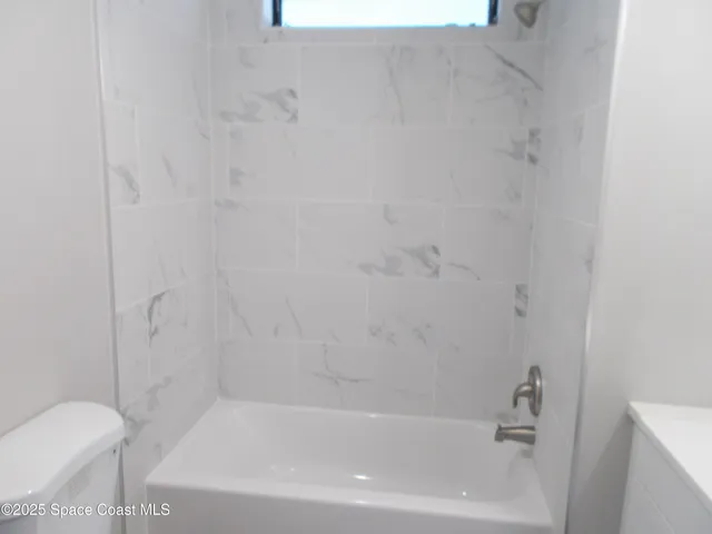 a bathroom with a bathtub