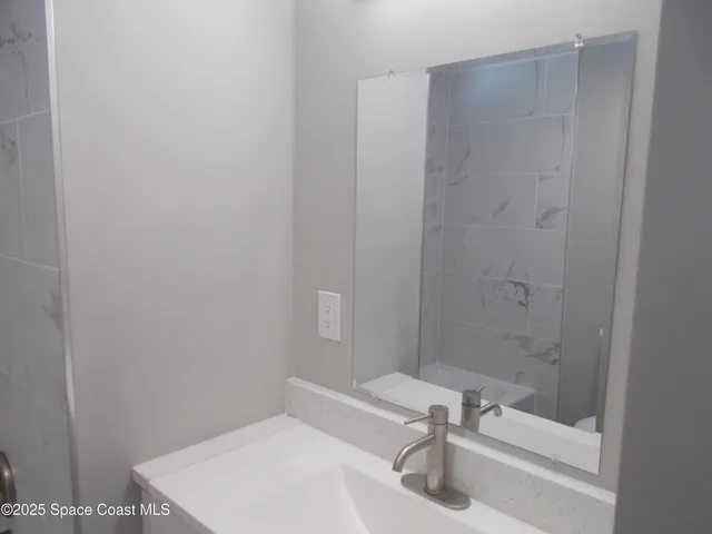 a bathroom with a sink and a tub