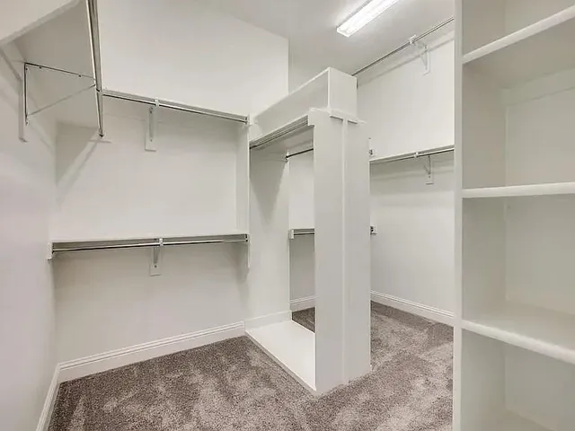 a view of an empty walk in closet