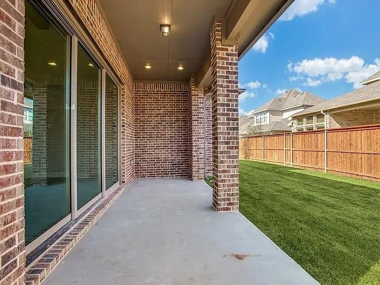 1322 Rolling Thunder Road Frisco, TX 75036 - Photo 19 of 20 a view of a porch with a big yard and potted plants
