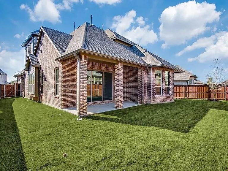 1322 Rolling Thunder Road Frisco, TX 75036 - Photo 20 of 20 a front view of a house with a garden
