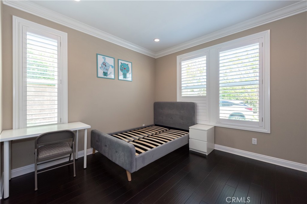 102 Diamondback Irvine, CA 92618 - Photo 17 of 47 a bedroom with a bed and a window