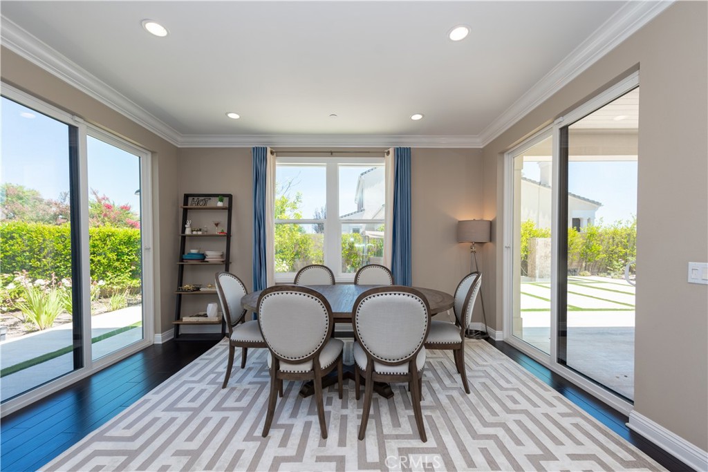 102 Diamondback Irvine, CA 92618 - Photo 8 of 47 a view of a dining room with furniture window and wooden floor