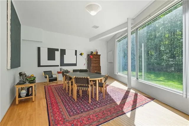 a living room with furniture and a table