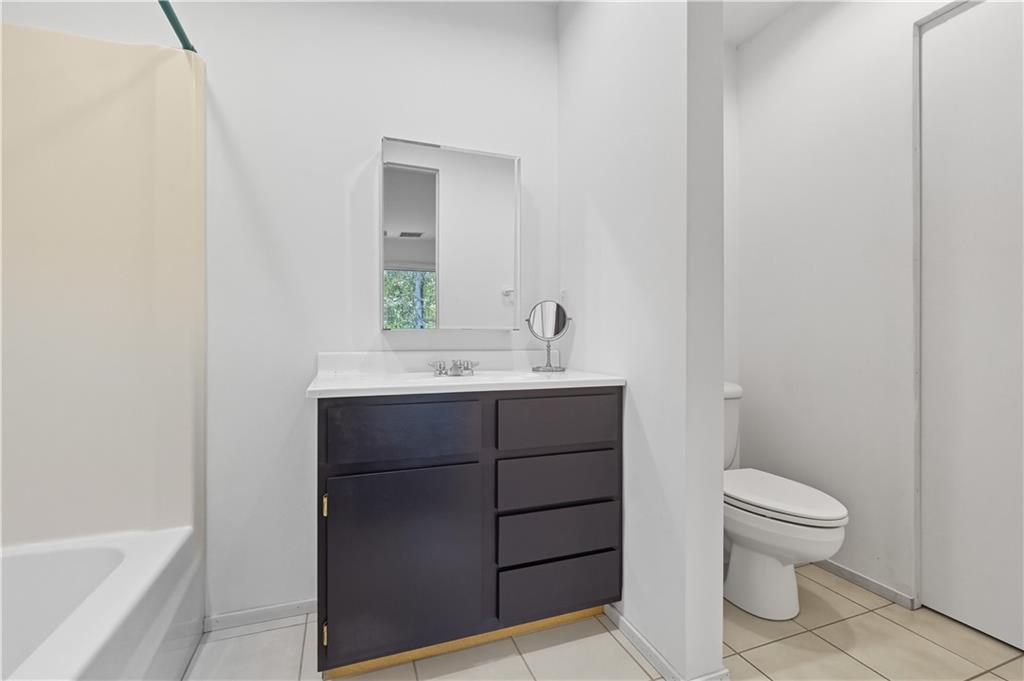 3191 Mercer Road New Castle, PA 16105 - Photo 31 of 50 a bathroom with a sink toilet and vanity