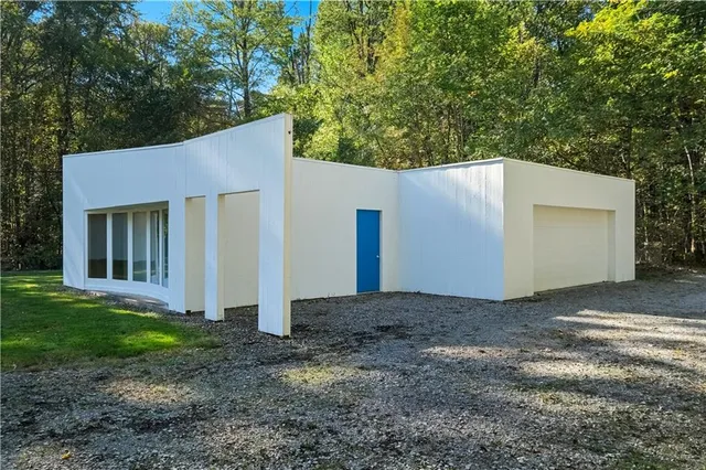 a view of backyard with green space