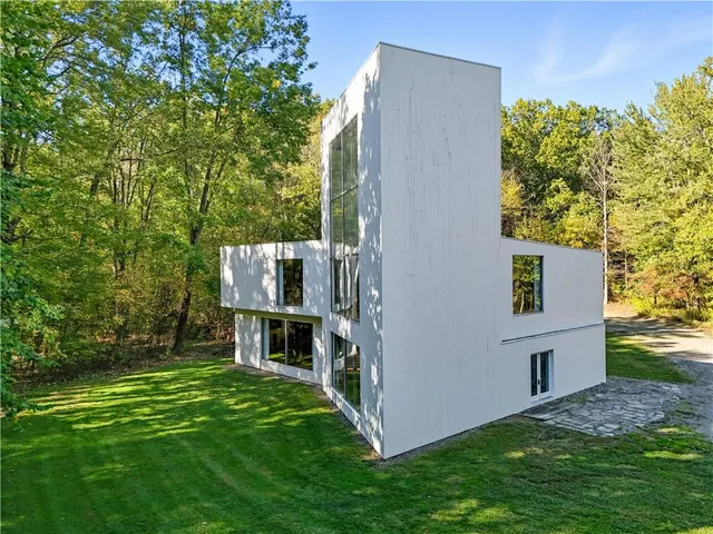 a view of an apartment with a garden