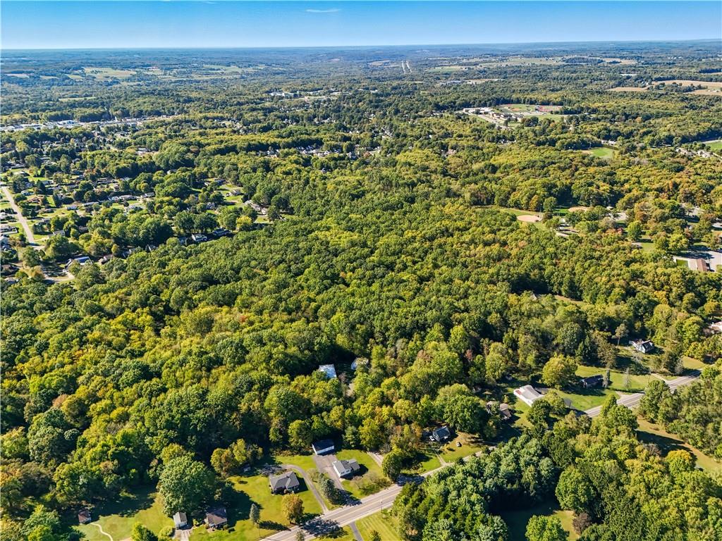 3191 Mercer Road New Castle, PA 16105 - Photo 50 of 50 an aerial view of a houses with a yard and mountain view in back