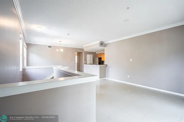 a bathroom with a sink toilet vanity and shower