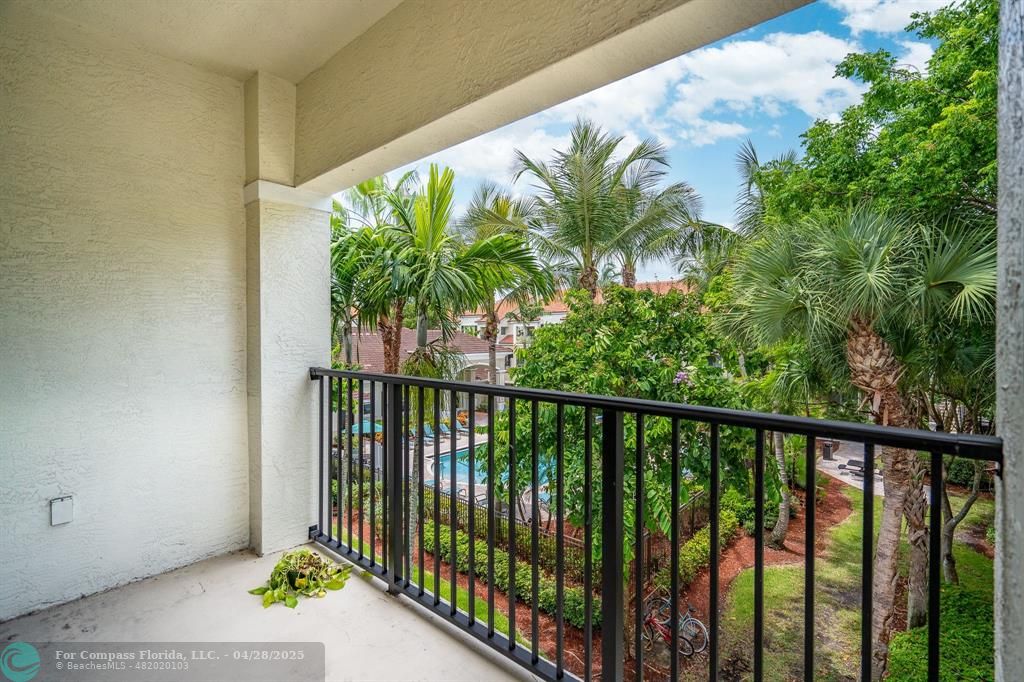 5840 West Sample Road, Unit 301 Coral Springs, FL 33067 - Photo 7 of 19 a view of a balcony