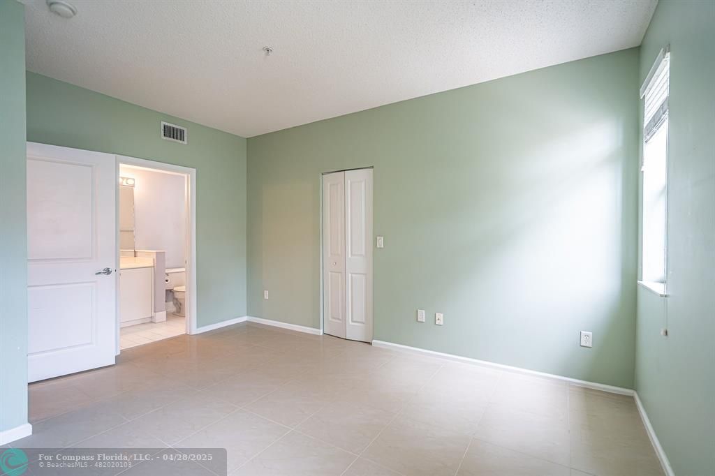 5840 West Sample Road, Unit 301 Coral Springs, FL 33067 - Photo 10 of 19 a view of an empty room