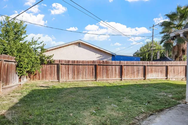 a front view of a house having yard
