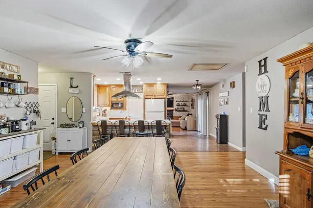 a very nice looking living room with a large window