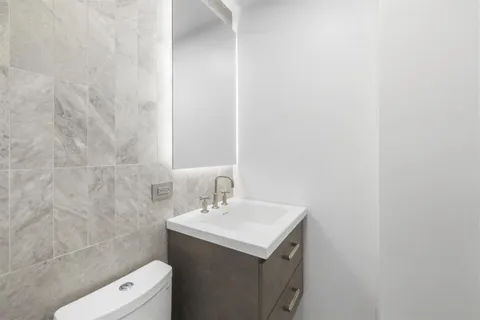a bathroom with a sink and a toilet