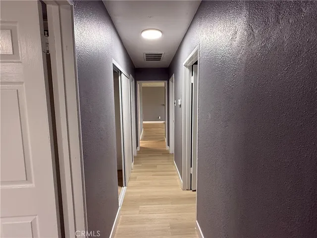a bathroom with a sink toilet and mirror